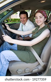 Teen Girl And Her Instructor, Ready For A Driving Lesson.