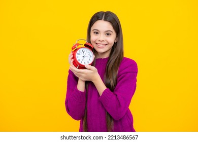 Teen Girl Holding Clock Over Yellow Background. Early Morning, Daily Schedule. Child Checking Time. Do Not Be Late. Punctual Kid With Alarm. Deadline Time.