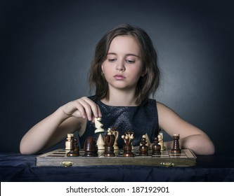 Teen Girl Playing Chess