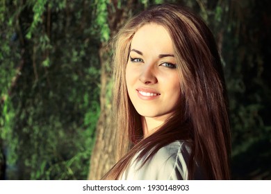 Teen Girl Portrait On Direct Sunlight On Sunset Summer