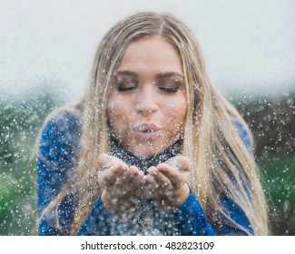Teen Girl Poses For A High School Senior Portrait Photo Outdoors Blowing Glitter