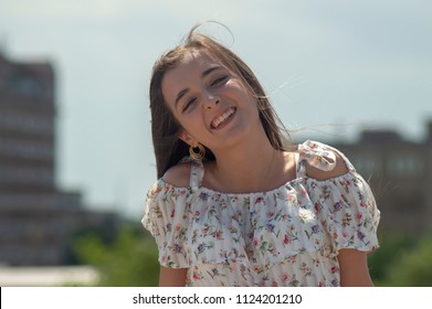 Teen Girl Posing with Wichita Skyline