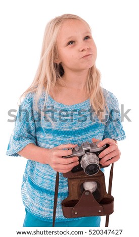 teen girl with retro camera on a white background