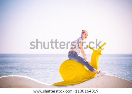 Surfer woman and yellow surfboard-France