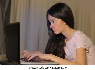 Teen Girl Using Laptop