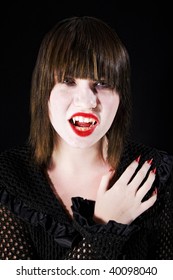 Teen Girl Vampire With Sharp Nails And Formidable Fangs