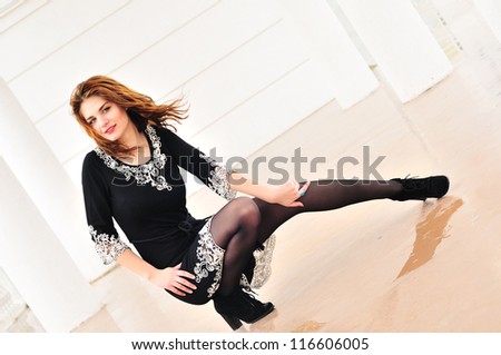 teen girl wearing dress posing