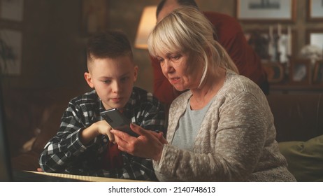 Teen Grandson Teaching His Aged Grandparents Stock Photo 2140748613 ...