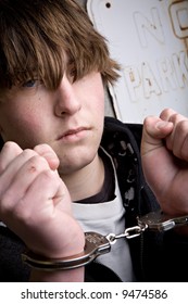 Teen In Handcuffs Under Arrest