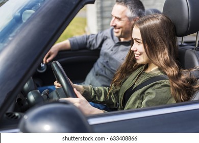 A Teen Learning To Drive Or Taking Driving Test.