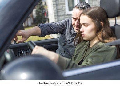 A Teen Learning To Drive Or Taking Driving Test.