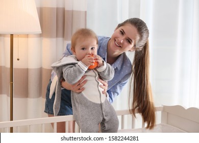 Teen Nanny With Cute Little Baby At Home