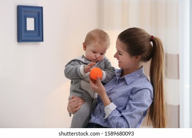 Teen Nanny With Cute Little Baby At Home