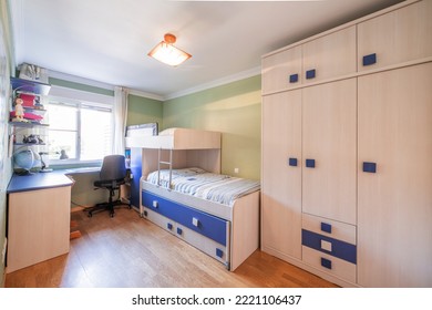 Teen Room With Train Bed And World Map Poster On Green Wall With Blue Detail Furniture