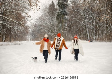 Teen Siblings And Their Mother Having Fun At Winter Park