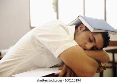 Teen Student Sleeping At Classroom