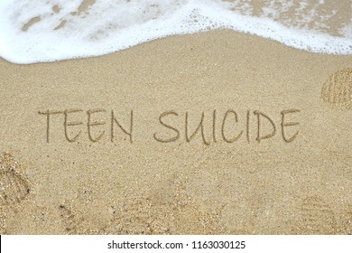 Teen Suicide Concept Using Sands At Beach