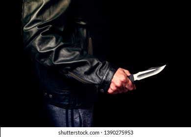 Teen threatened with a knife on the street, night lighting