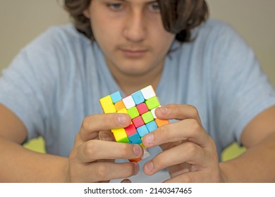 Teen Turning A Magic Cube