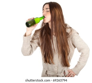teen woman drinking green beer from green bottle