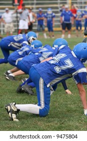 Teen Youth Football Players In Line Of Scrimmage