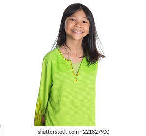 Teenage Asian Malay Girl In Traditional Dress Over White Background