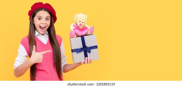 Teenage Beauty Go Shopping. Tween And Youth. Purchase A Gift. Happy French Teen Girl Pointing Finger. Kid Girl With Gift, Horizontal Poster. Banner Header With Copy Space.