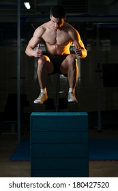 Teenage Boy Doing Box Jump - Young Men Performing A Box Jump During A Workout