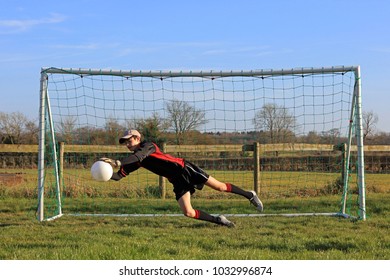 Teenage Boy Goalkeeper Saving Football Soccer Stock Photo (Edit Now ...