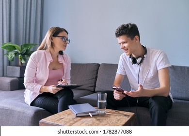 Teenage Boy At Meeting With Female Professional Doctor Psychologist. Adolescent Counseling Help, School Psychologist, Child Social Worker, Adolescent Problems