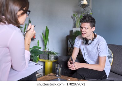 Teenage Boy At Meeting With Female Professional Doctor Psychologist. Adolescent Counseling Help, School Psychologist, Child Social Worker, Adolescent Problems