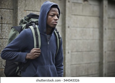 Teenage Boy On The Streets With Rucksack