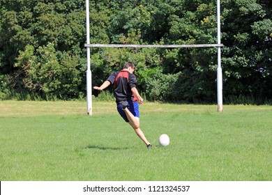 Teenage Boy Playing Rugby On A Rugby Pitch. - Powered by Shutterstock