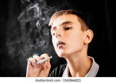 Teenage Boy Smoking Cigarette Rolled Dollar Stock Photo (Edit Now ...