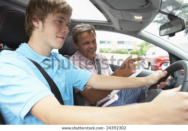 Teenage Boy Taking A Driving\
Lesson