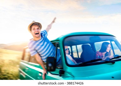 Teenage Boys And Girls Inside An Old Campervan, Roadtrip