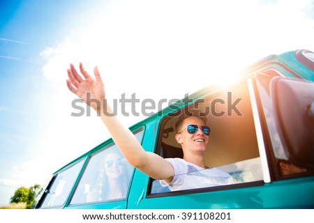 Similar – A teenage boy stretches down, pulling his head to his knees, outdoors