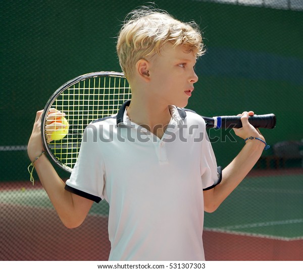 Teenage Caucasian Boy Holding Tennis Racket Stock Photo Edit Now