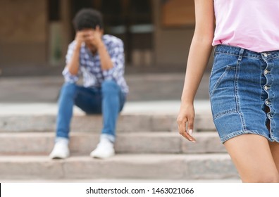 Teenage Couple Breaking Up After Argument. Girlfriend Leaving Her Sad Boyfriend.