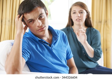 Teenage Couple Having Argument At Home