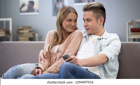 Teenage Couple In Love Cuddling, Shy Looking Into Eyes, First Relationship