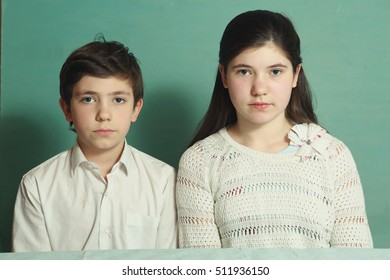 teenage couple siblings brother and sister close up photo serious, Teens close up face
