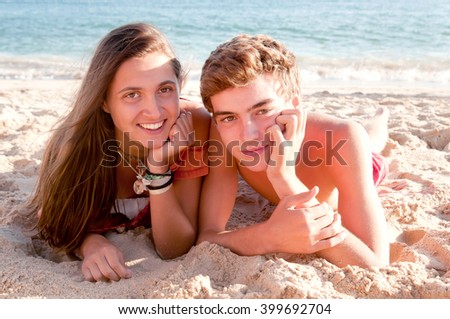 teenage friends at the beach