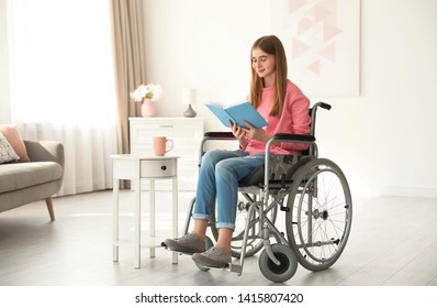 Teenage girl with book in wheelchair at home - Powered by Shutterstock