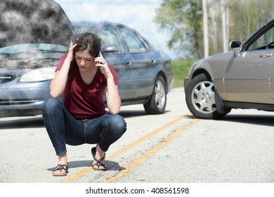 Teenage girl calling road service after car accident. - Shutterstock ID 408561598