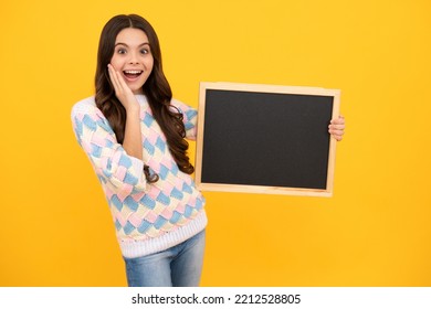 Teenage Girl Child Hold Chalkboard. Elementary School Girl Holding A Blank Blackboard Chalk Board. Copy Space, Mockup Banner.