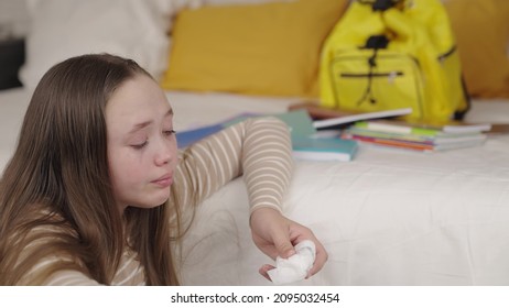 Teenage Girl Crying Wiping Tears From Wet Eyes On Her Face, School Difficulties Upset Child, Resentment Relationships With Peers, Psycho Kid Whims, Sadness And Loneliness With Textbooks And Backpack