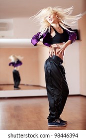 Teenage Girl Dancing Hip-hop In Gym Classroom