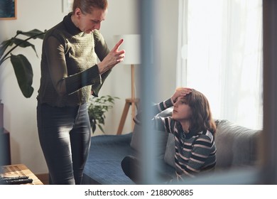 Teenage Girl In Difficult Mood With Angry Mom.