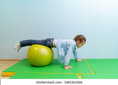 A Teenage Girl Engaged In Physical Therapy On Ball Sensory Integration